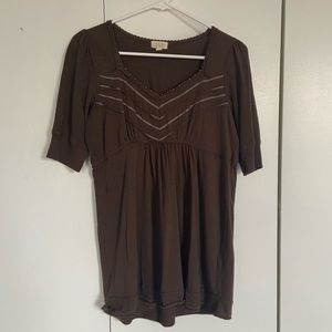 Brown baby doll top with empire waist and detailed bust